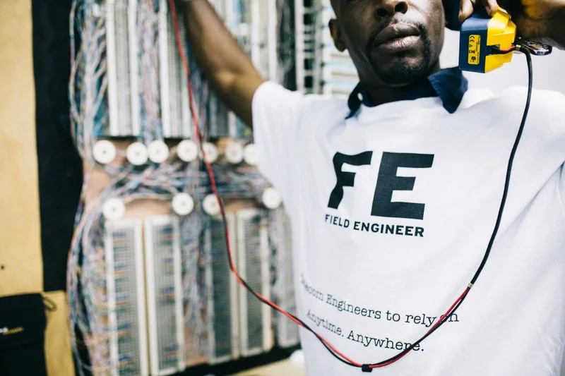 Field technician using a GPS-tracked mobile device